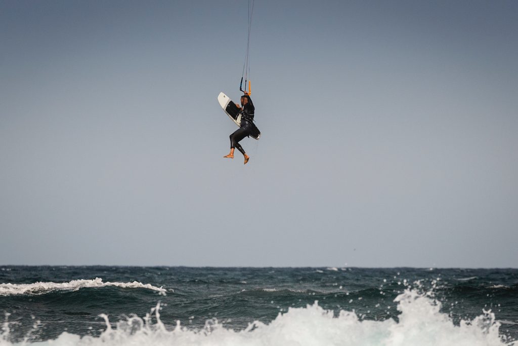 a kiteboarder performing a tik tak, freestyle trick
